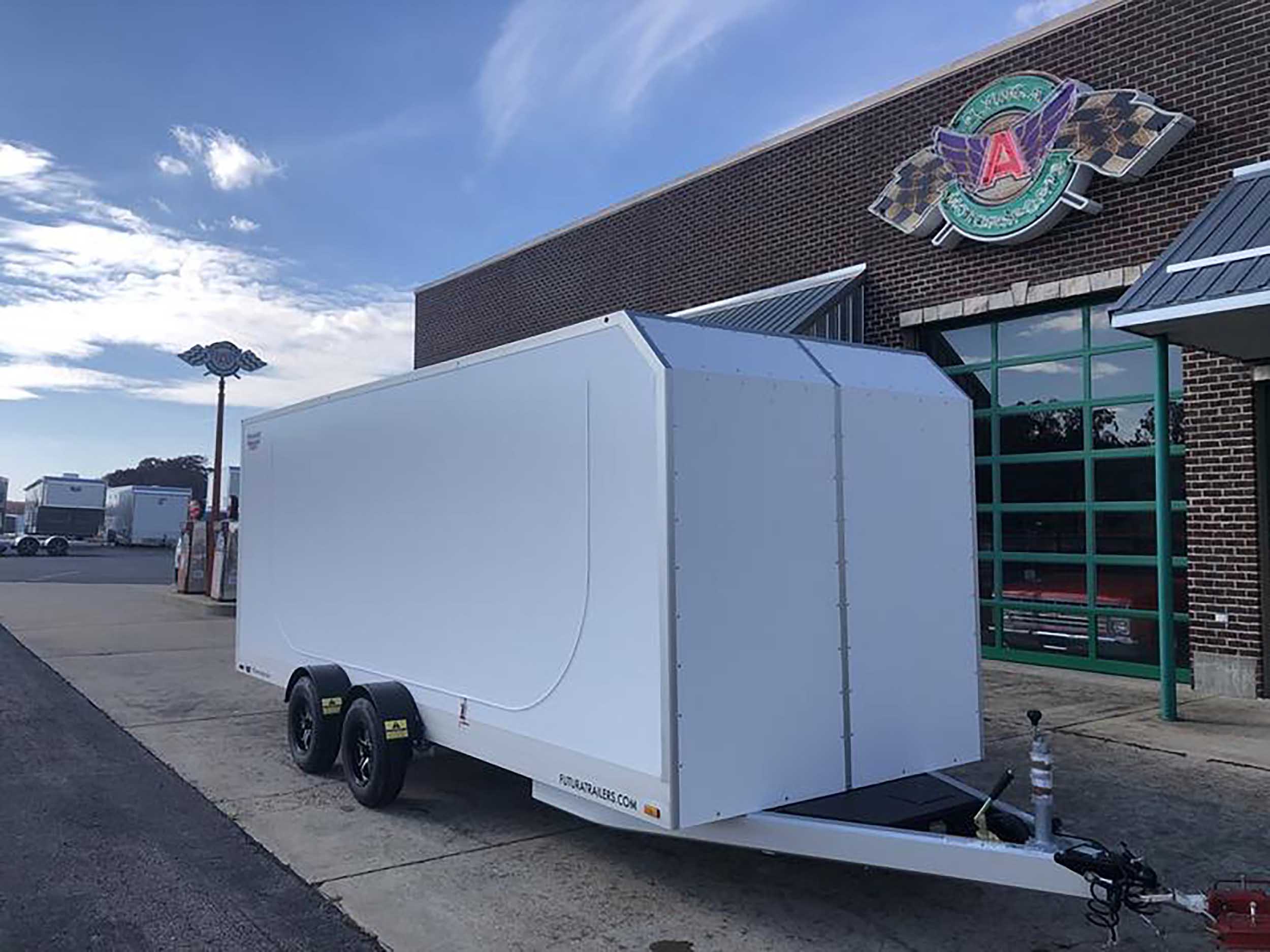 An Enclosed Trailer To Easily Load, Transport, & Protect Your Vehicle
